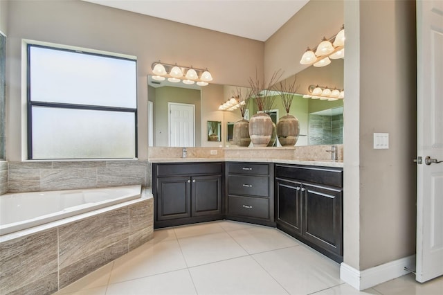 16246 26th St E, Parrish, FL 34219 - full bath with a garden tub, double vanity, and tile patterned flooring