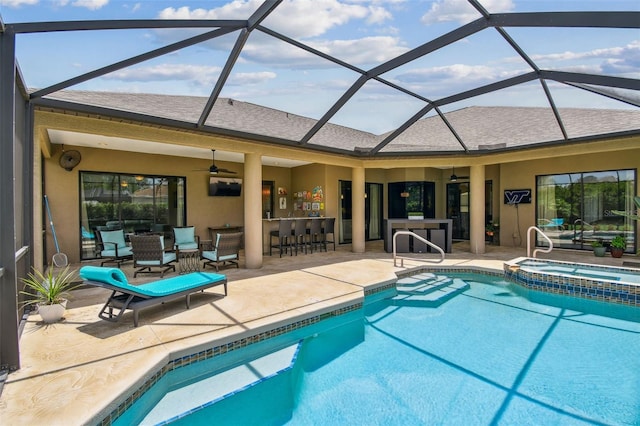 16246 26th St E, Parrish, FL 34219 - view of pool with a patio, a ceiling fan, a pool with connected hot tub, and a lanai