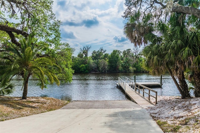 16246 26th St E, Parrish, FL 34219 - dock featuring a boat ramp and a water view