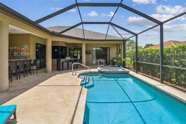 16246 26th St E, Parrish, FL 34219 - view of pool featuring a patio area, a lanai, a pool with connected hot tub, and a ceiling fan