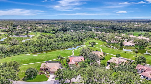 3388 Highlands Bridge Rd, Sarasota, FL 34235 - aerial perspective of suburban area featuring a local golf course, a tree filled landscape, and a nearby body of water