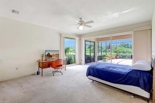 3388 Highlands Bridge Rd, Sarasota, FL 34235 - bedroom with access to exterior, carpet flooring, a ceiling fan, and an office area
