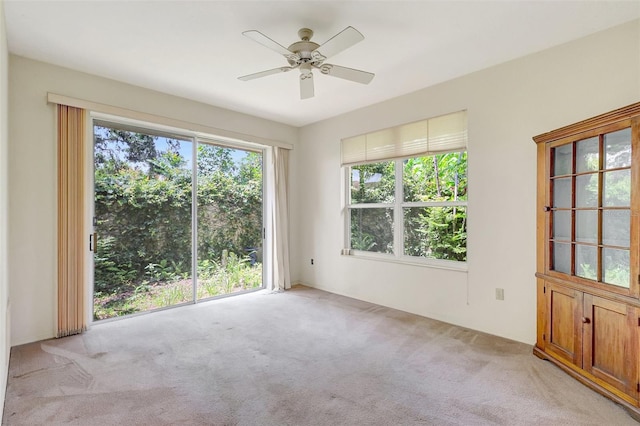 3388 Highlands Bridge Rd, Sarasota, FL 34235 - spare room featuring light colored carpet and ceiling fan