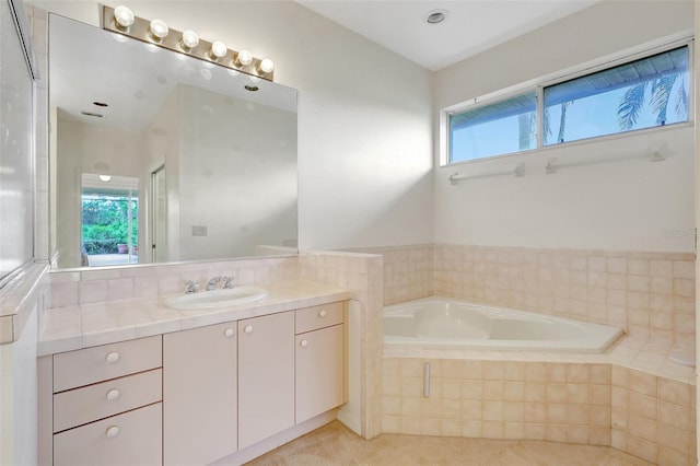 3388 Highlands Bridge Rd, Sarasota, FL 34235 - bathroom featuring vanity, a garden tub, and plenty of natural light