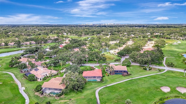 3388 Highlands Bridge Rd, Sarasota, FL 34235 - view of property location with a nearby body of water, a golf club, nearby suburban area, and a tree filled landscape