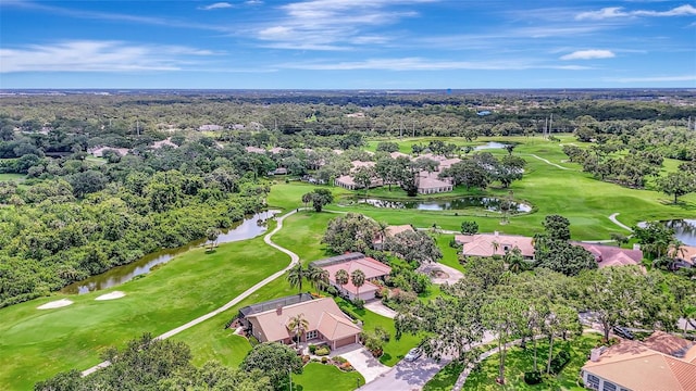3388 Highlands Bridge Rd, Sarasota, FL 34235 - aerial perspective of suburban area featuring a large body of water, a local golf course, and a tree filled landscape