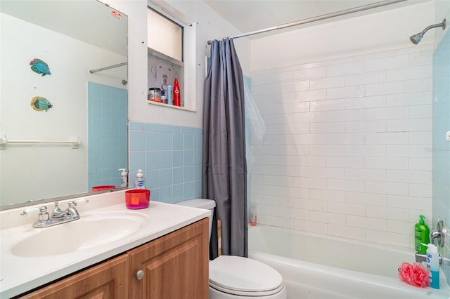 3921 Marlborough Pl, Sarasota, FL 34241 - bathroom with vanity, toilet, shower / bathtub combination with curtain, and tile walls