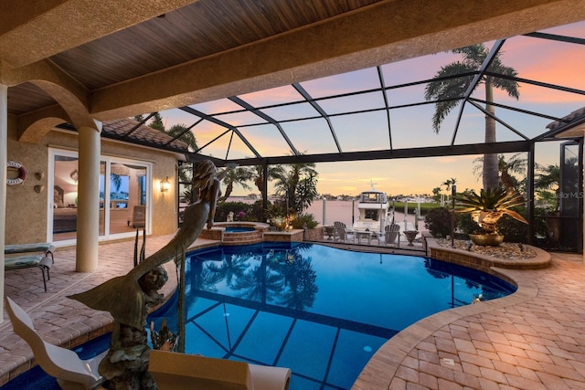 801 3rd St E, Palmetto, FL 34221 - view of pool with a patio area, a lanai, and a pool with connected hot tub