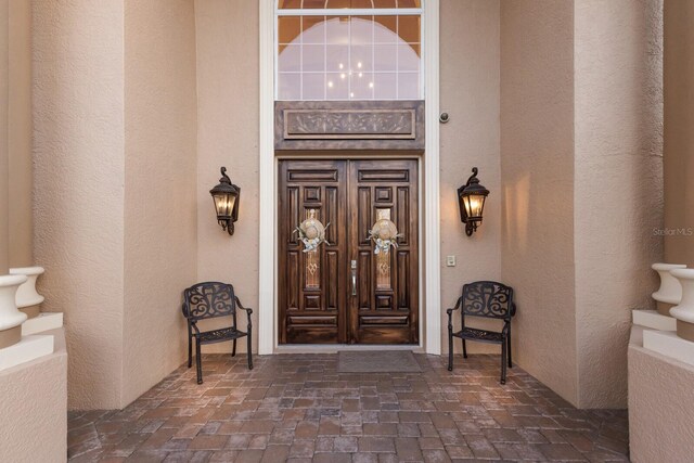 801 3rd St E, Palmetto, FL 34221 - entrance to property featuring stucco siding