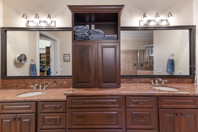801 3rd St E, Palmetto, FL 34221 - full bathroom with double vanity, tiled shower, and a spacious closet