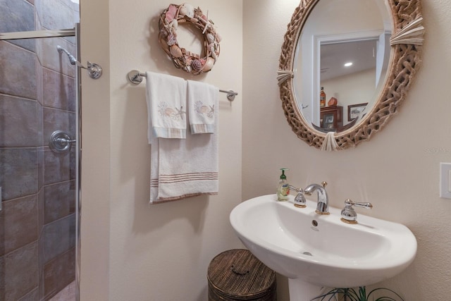 801 3rd St E, Palmetto, FL 34221 - full bath featuring a tile shower and a sink