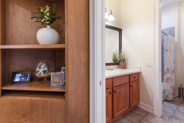 801 3rd St E, Palmetto, FL 34221 - full bathroom featuring vanity, tile patterned floors, and a shower with curtain