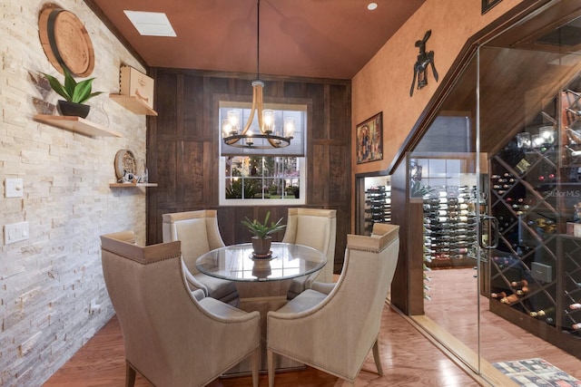 801 3rd St E, Palmetto, FL 34221 - dining space featuring a chandelier and wood finished floors