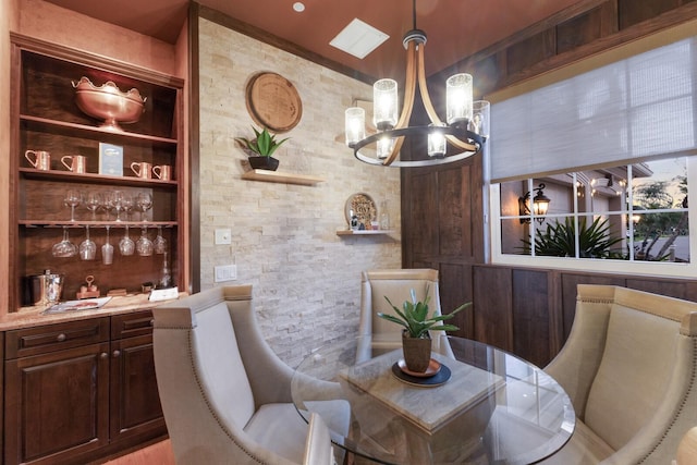 801 3rd St E, Palmetto, FL 34221 - dining space with a chandelier