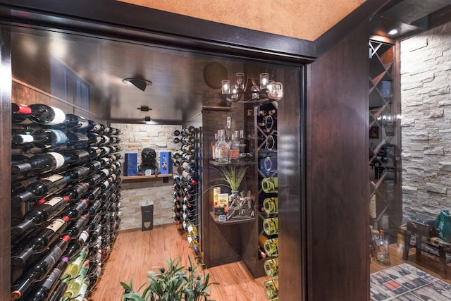 801 3rd St E, Palmetto, FL 34221 - wine area featuring wood finished floors and a chandelier