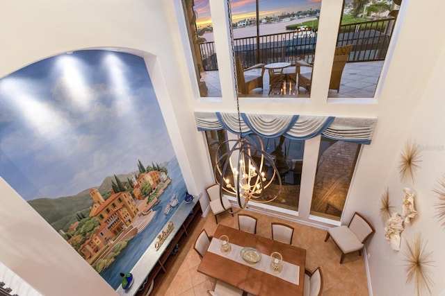 801 3rd St E, Palmetto, FL 34221 - detailed view of a chandelier, arched walkways, and baseboards