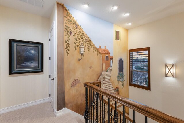 801 3rd St E, Palmetto, FL 34221 - hallway featuring an upstairs landing, carpet, baseboards, and recessed lighting