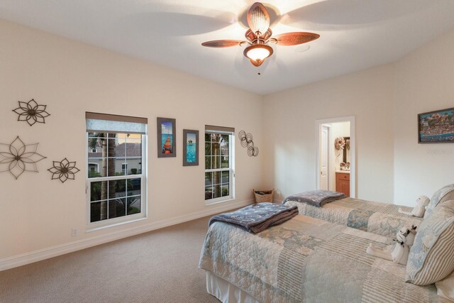 801 3rd St E, Palmetto, FL 34221 - bedroom with carpet, baseboards, and ceiling fan