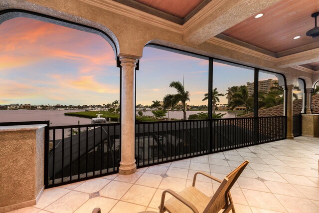 801 3rd St E, Palmetto, FL 34221 - patio terrace at dusk with a water view