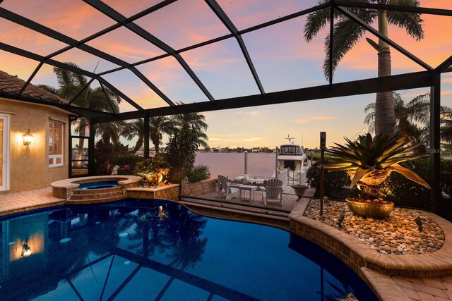 801 3rd St E, Palmetto, FL 34221 - view of pool with a patio, glass enclosure, and a pool with connected hot tub