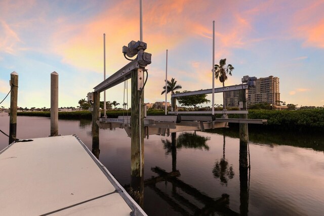 801 3rd St E, Palmetto, FL 34221 - dock with a water view and boat lift