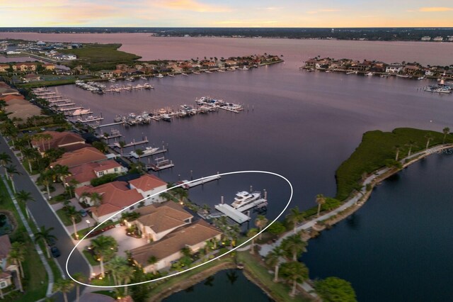 801 3rd St E, Palmetto, FL 34221 - aerial view at dusk of a water view and view of marina