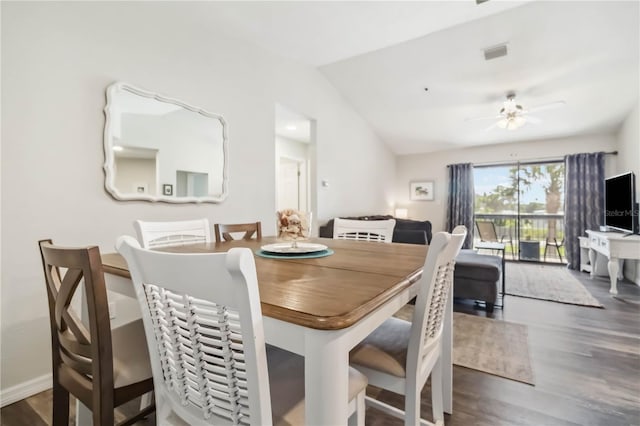4061 Crockers Lake Blvd Unit 27, Sarasota, FL 34238 - dining room with lofted ceiling, wood finished floors, a ceiling fan, and baseboards