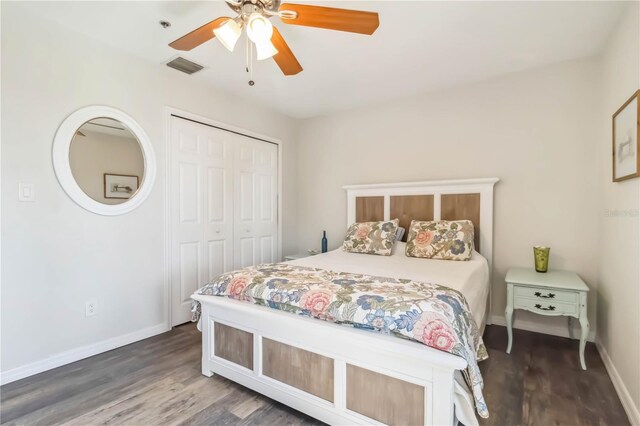 4061 Crockers Lake Blvd Unit 27, Sarasota, FL 34238 - bedroom featuring wood finished floors, baseboards, a closet, and a ceiling fan