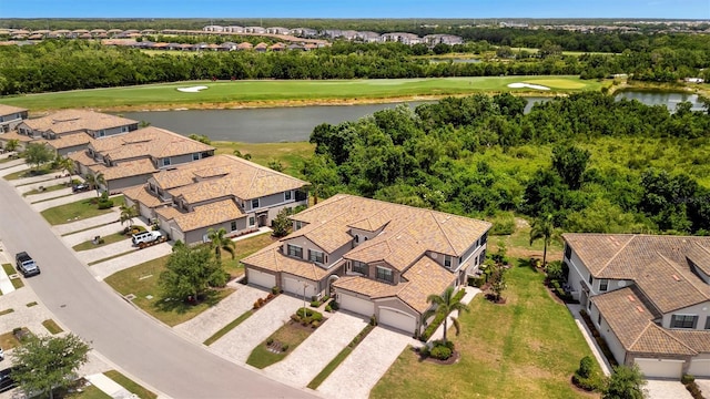 5843 Wake Forest Run Unit 104, Bradenton, FL 34211 - aerial view of residential area with a golf course and a nearby body of water