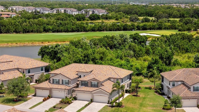 5843 Wake Forest Run Unit 104, Bradenton, FL 34211 - aerial view of residential area featuring a golf course and a nearby body of water