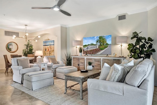 5843 Wake Forest Run Unit 104, Bradenton, FL 34211 - living room with crown molding, ceiling fan, and a chandelier