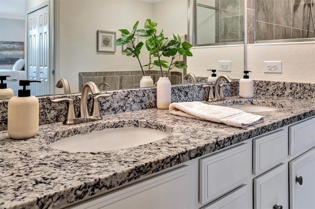 5843 Wake Forest Run Unit 104, Bradenton, FL 34211 - bathroom featuring double vanity