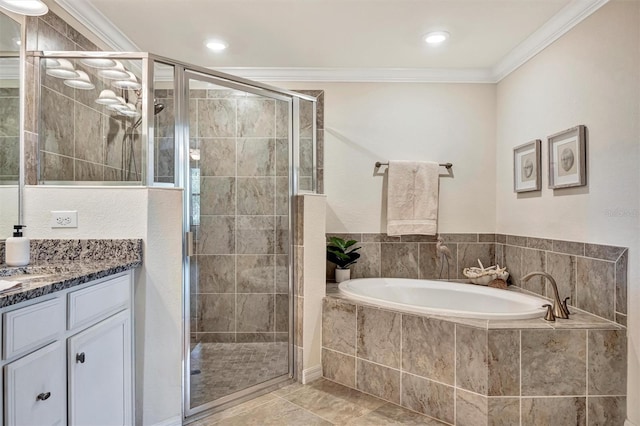5843 Wake Forest Run Unit 104, Bradenton, FL 34211 - full bathroom featuring a garden tub, vanity, ornamental molding, a shower stall, and recessed lighting