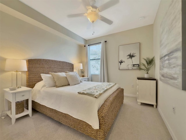 5843 Wake Forest Run Unit 104, Bradenton, FL 34211 - bedroom featuring carpet, baseboards, and a ceiling fan
