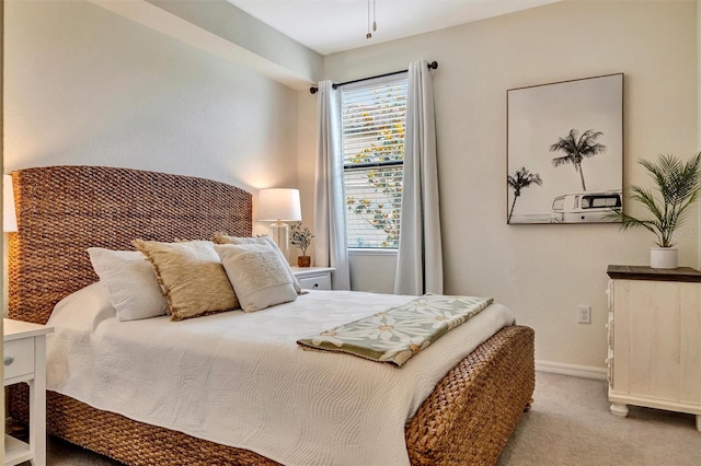 5843 Wake Forest Run Unit 104, Bradenton, FL 34211 - carpeted bedroom with baseboards