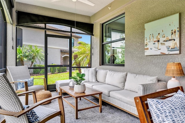 5843 Wake Forest Run Unit 104, Bradenton, FL 34211 - sunroom / solarium with a ceiling fan and outdoor lounge area