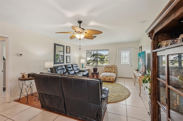 1190 Jamaica Rd, Venice, FL 34293 - living room with light tile patterned flooring and a ceiling fan