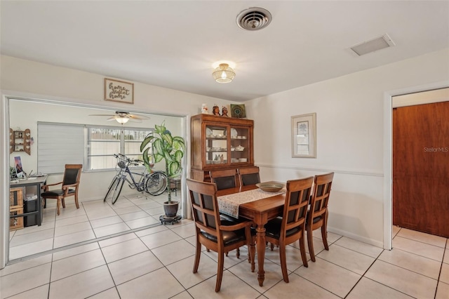 1190 Jamaica Rd, Venice, FL 34293 - dining space with light tile patterned flooring and baseboards