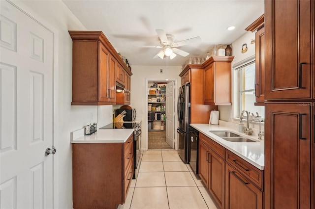 1190 Jamaica Rd, Venice, FL 34293 - kitchen featuring a sink, black electric range, dishwasher, a ceiling fan, and light countertops