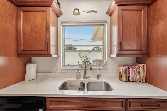 1190 Jamaica Rd, Venice, FL 34293 - kitchen with dishwasher, a sink, and brown cabinetry