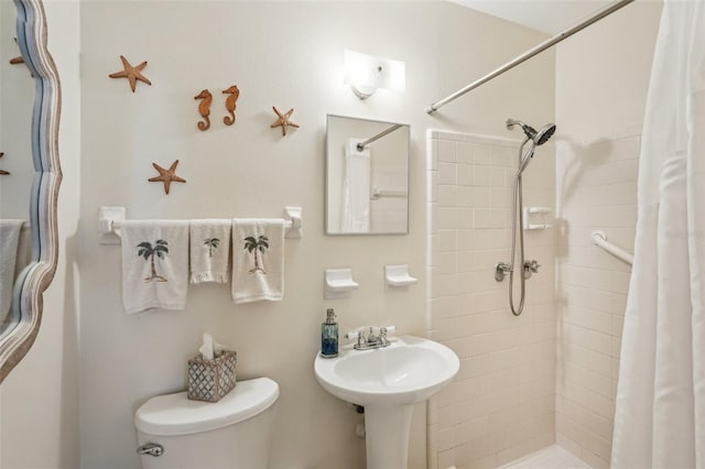 1190 Jamaica Rd, Venice, FL 34293 - full bath with toilet, tiled shower, and a sink
