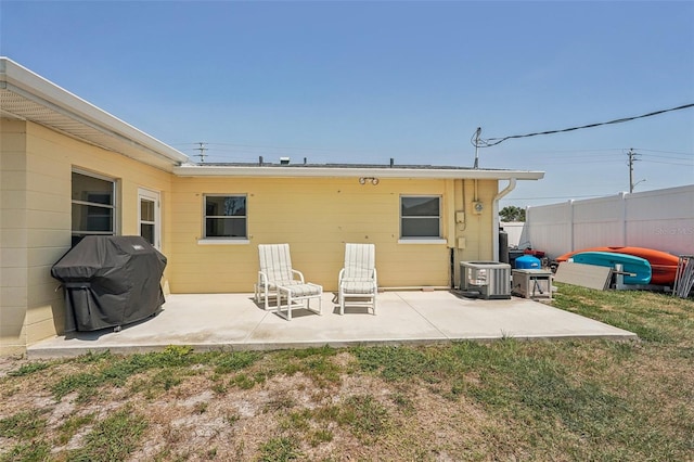 1190 Jamaica Rd, Venice, FL 34293 - rear view of house featuring a patio area and central AC unit