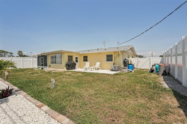 1190 Jamaica Rd, Venice, FL 34293 - back of house featuring central AC and a patio area