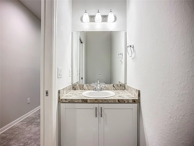 1053 Grantham Dr, Sarasota, FL 34234 - bathroom featuring vanity and baseboards