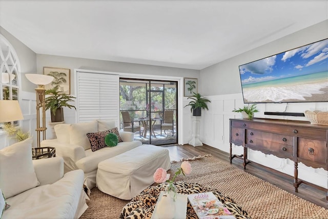 6501 Mourning Dove Dr Unit 215, Bradenton, FL 34210 - living room featuring wainscoting and wood finished floors
