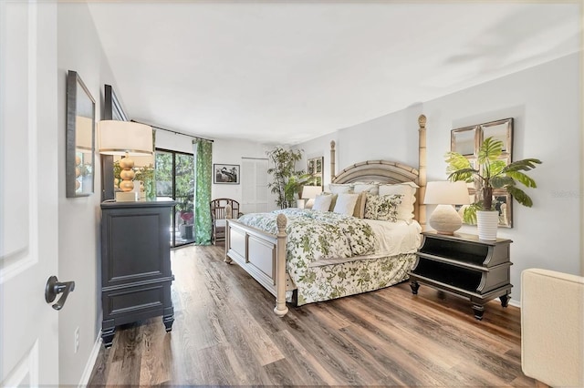 6501 Mourning Dove Dr Unit 215, Bradenton, FL 34210 - bedroom featuring wood finished floors and baseboards