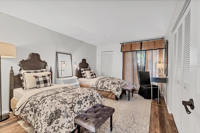 6501 Mourning Dove Dr Unit 215, Bradenton, FL 34210 - bedroom with wood finished floors and baseboards