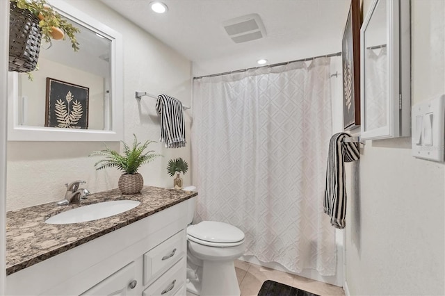 6501 Mourning Dove Dr Unit 215, Bradenton, FL 34210 - full bath featuring vanity, toilet, recessed lighting, and tile patterned flooring