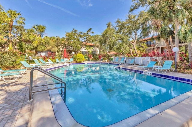 6501 Mourning Dove Dr Unit 215, Bradenton, FL 34210 - community pool featuring a patio area