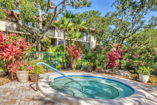 6501 Mourning Dove Dr Unit 215, Bradenton, FL 34210 - view of pool featuring a hot tub and a swimming pool